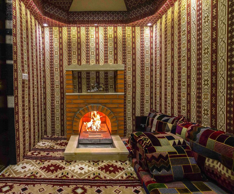 Rest Night Serviced Apartments- Alhamra Ριάντ Εξωτερικό φωτογραφία A majlis with a fireplace